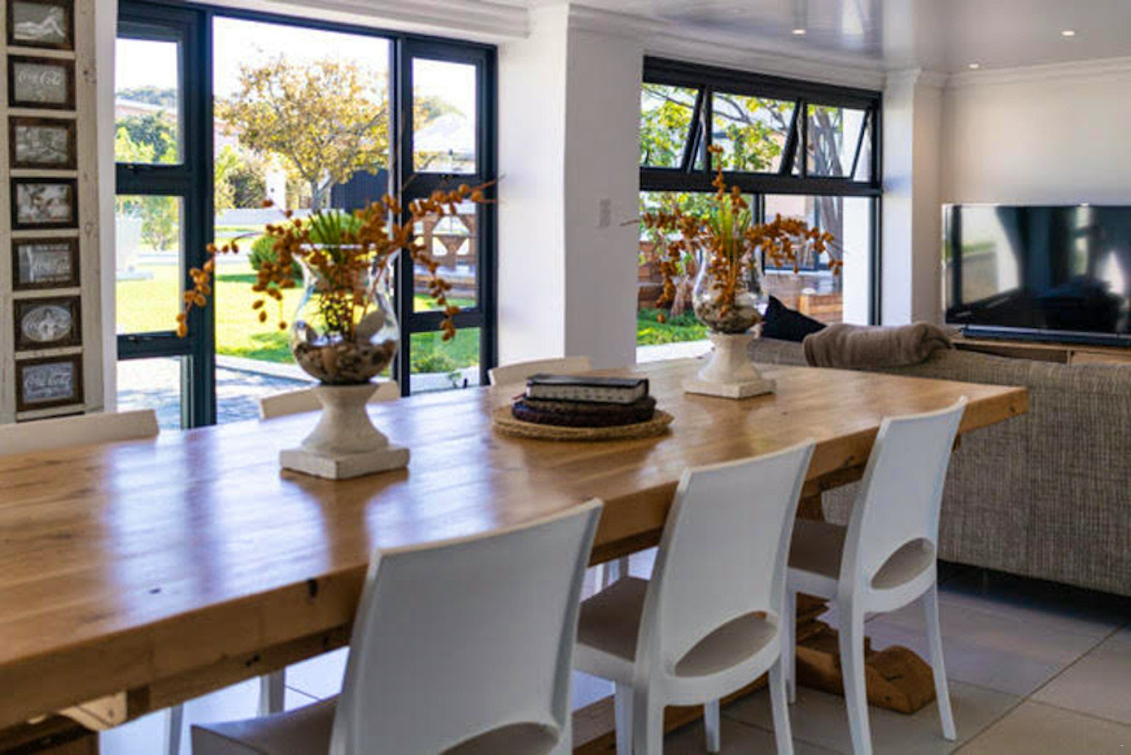 Communal dining table with garden views
